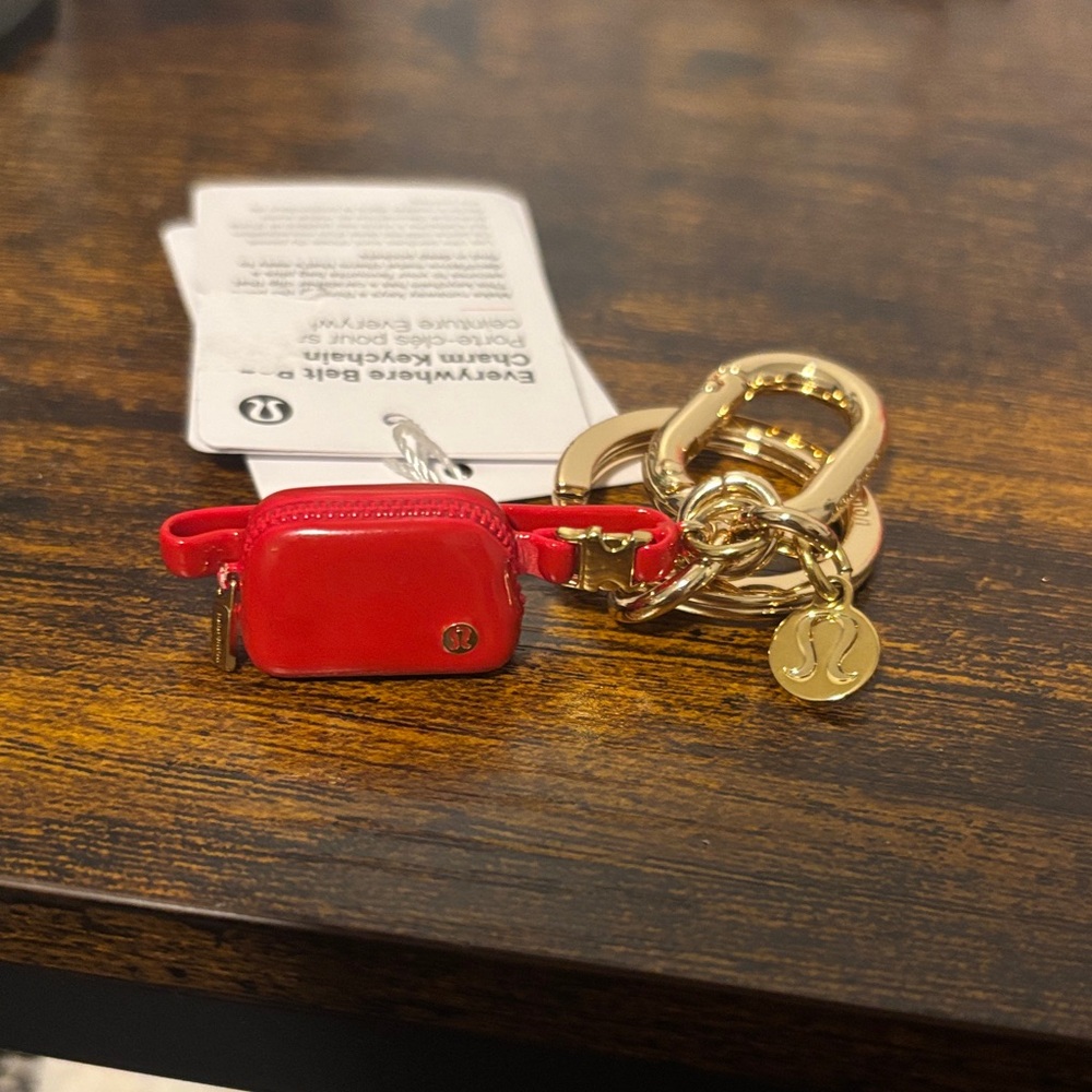 Red lulu lemon 🍋 everywhere belt bag charm Keychain with Gold Accents